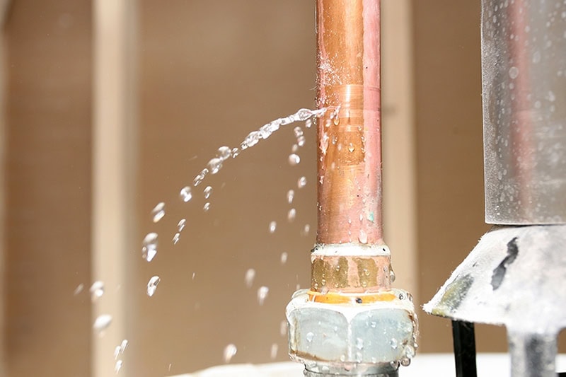 Why Is My Furnace Leaking Water? A pipe leaking water.